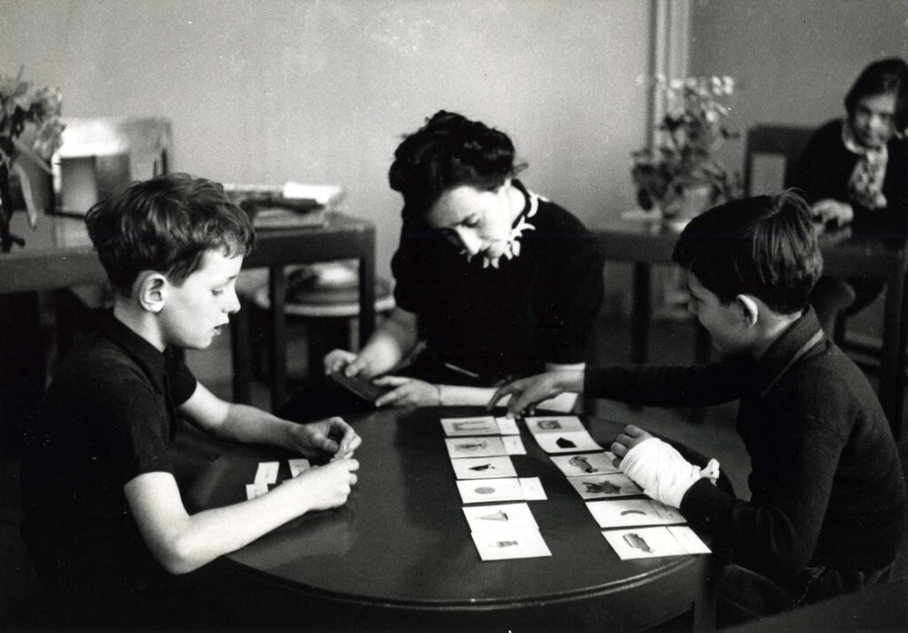 Maria Montessori with students - founder of the Montessori method